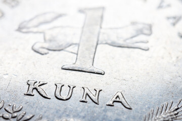 A fragment of croatian metal coin macro photo