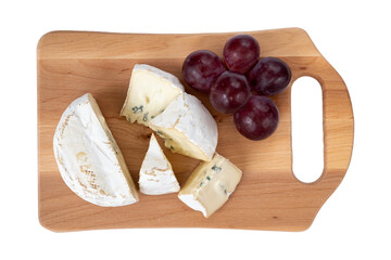 cheese with grape on board isolated on white, top view