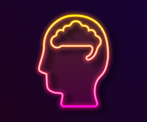 Glowing neon line Human brain icon isolated on black background. Vector
