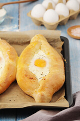 Two Georgian Khachapuri with eggs