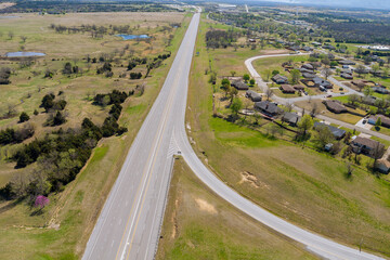 Aerial view road highway near a small town in villages
