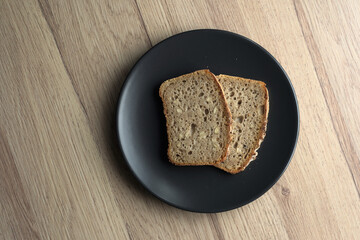 a two slices of bread on a dish