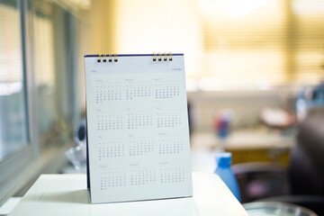 Obraz premium Blurred celendar in white tone.