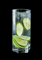 cold lemonade in high transparent glasses with lemons on a black background