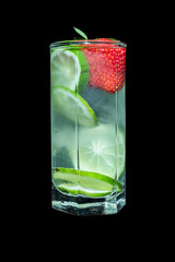 cold lemonade in high transparent glasses with lemons on a black background