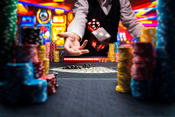 Man gambling at the craps table - 429016868