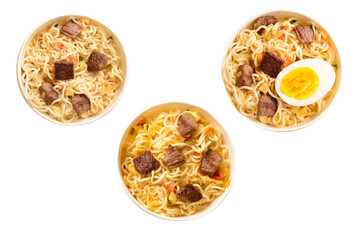 Paper cup with instant ramen noodles with beef and vegetables.