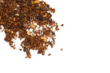 Chocolate granola cereal with nuts in a wooden spoon.