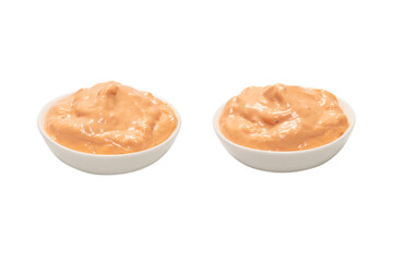 Sauce in a bowl isolated on white.