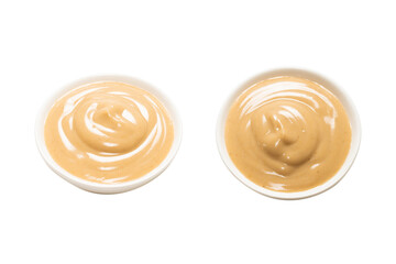 Mushroom sauce in a bowl isolated on white background.