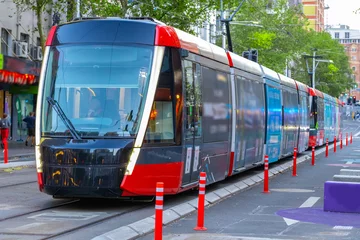 Foto auf Acrylglas Antireflex Tram moving through George St in Sydney NSW Australia © Elias Bitar