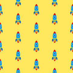 Colourful launching rockets with fire, seamless pattern on yellow background
