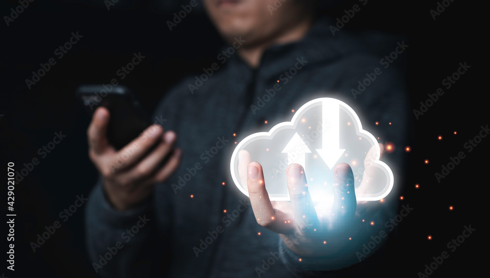 Poster businessman holding white cloud computing icon from hand drawing with blue bokeh background , cloud 