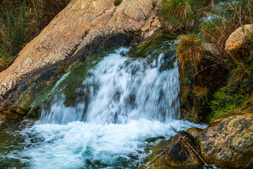 Idyllic waterfalls in a river, near Sot de Chera town, in Valencia (Spain)