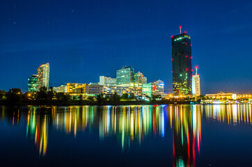 View of the UNO city complex including VIC,UN headquarters and a riverside promenade full of bars...