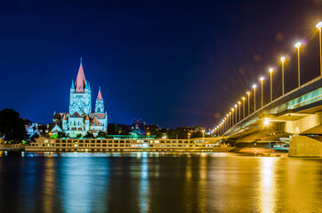 Church Heiliger Franz of Assisi at Mexikoplatz during night, Vienna, Austria
