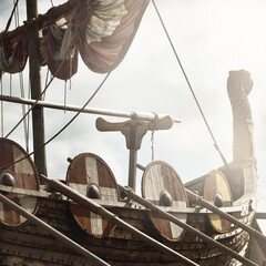 Old wooden viking snekkja longship type, close-up. Nautical vessel, tall ship, traditional craft,...