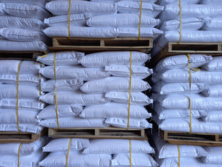 Chemical fertilizer The product stock is packed in sacks, stacked in the warehouse, waiting for...