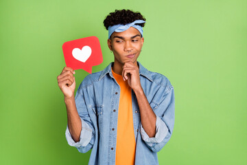 Photo portrait of handsome guy thoughtful looking on like icon social media feedback isolated vivid...