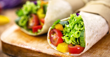 Burritos wraps with mushrooms, pepper and vegetables, spicy Mexican food