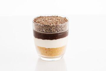 Chocolate dessert with whipped cream on a white background
