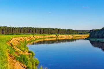 Fototapeta na wymiar summer landscape with river forest and blue sky
