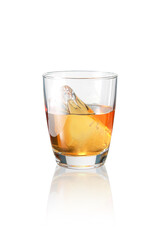 Ice and amber whiskey in a glass,with Clipping Path.