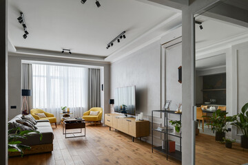 living room, living room with large window, modern apartment