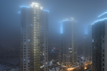 night city, architecture, skyscrapers, city in the fog