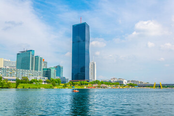 View of the UNO city complex including VIC, Donauturm, UN headquarters and a riverside promenade...