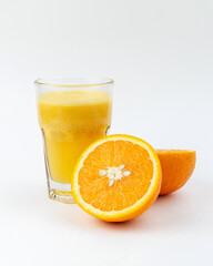 a glass of orange fresh on a white background