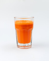 a glass of brand fresh juice on a white background