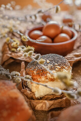 Easter still life in warm colors on a wooden base.
