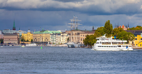 Obraz premium View of the city embankment on a sunny morning. Stockholm.