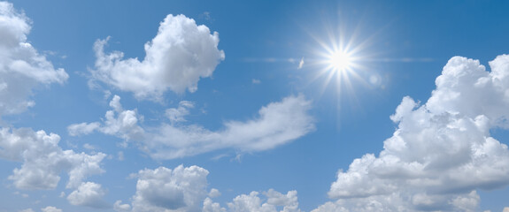 Naklejka na ściany i meble Beautiful clear blue sky with white clouds and sun