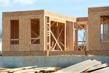 start of construction of a plywood house new frame