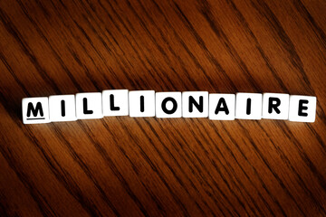 Millionaire Spelled out with Letters Motivation for Financial Success