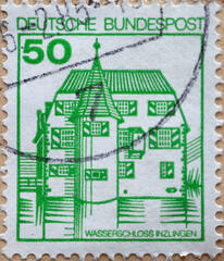 GERMANY - CIRCA 1980 : a postage stamp from Germany, showing historical castles in Germany. . Inzlinger moated castle