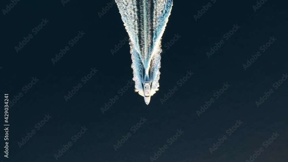 Wall mural croatia. aerial view of luxury floating boat on blue adriatic sea at sunny day. fast boat on the sea