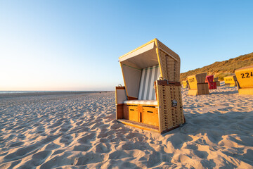 Empty beach chair at the North Sea coast, Sylt, Schleswig-Holstein, Germany