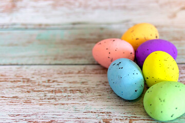 Colorful Easter Egg side border against a turquoise background. Collection of photos perfect colorful easter egg isolated on a rustic blue background. Photography of an easter egg decoration.