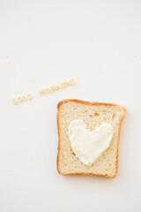 sandwich for breakfast in form of heart with cheese - good morning inscription