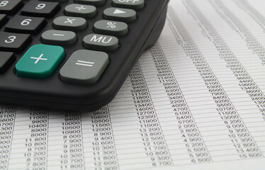 Business and calculating concept. Calculator on financial report.