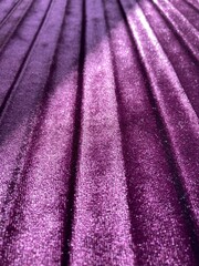 Burgundy purple background of velvet fabric, closeup. Stripes - 429036283