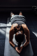 woman exercising doing a plank, core workout
