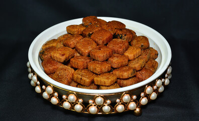 Fried Makrout - Algerian semolina, dates and honey sweets, traditional North Africa sweet food