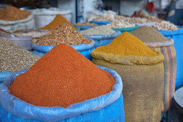 Chilly in the foreground sharp. Turmeric/yellow root slightly out of focus. Do you fancy Indian or...