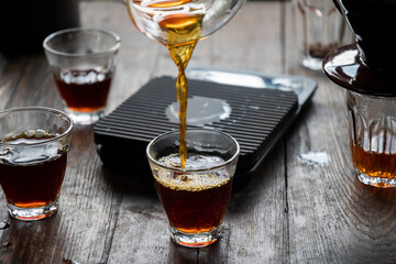 Coffee drip on the table, Drip brewing, filtered coffee, or pour-over is a method which involves pouring water over roasted, ground coffee beans contained in a filter.