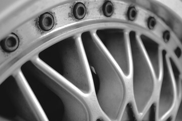 retro car wheel on black and white color