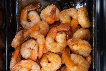 Pickled shrimp in plastic container